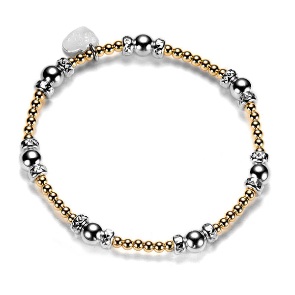Bracelet with silver and gold beads on a white background