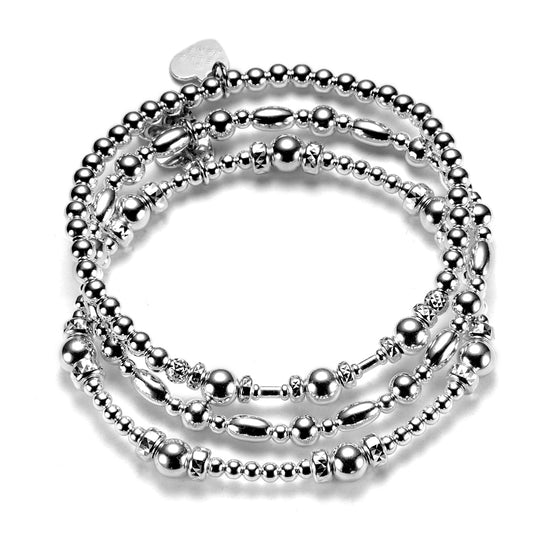 A trio of sterling silver beaded stacking bracelets to be worn as a stack