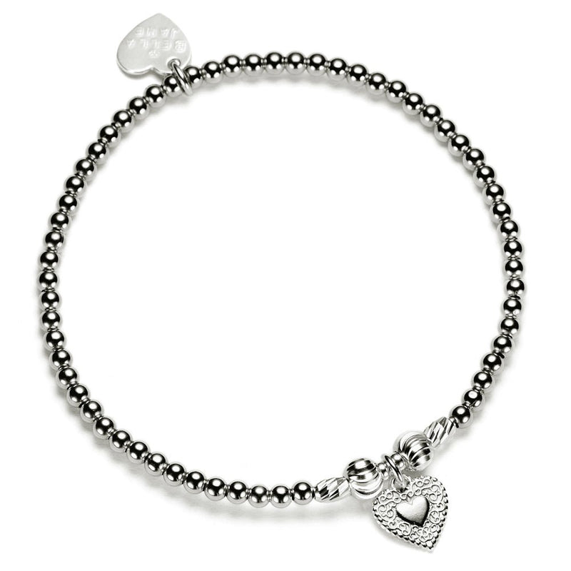 Silver beaded bracelet with heart-shaped charm on a white background