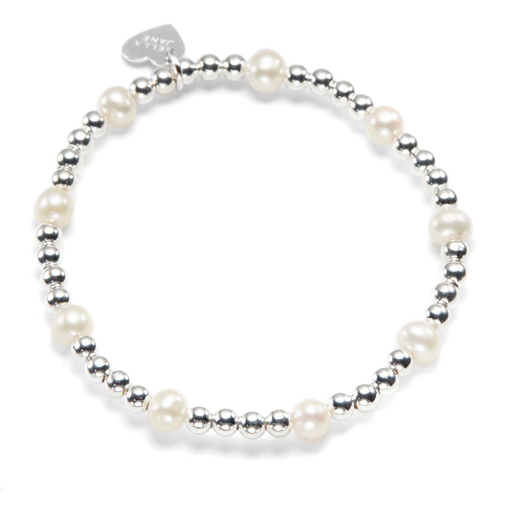 Pearl and silver beaded bracelet on a white background