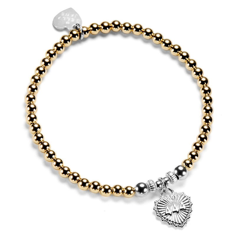 A close-up photo on a white background, of a gold-filled beaded bracelet with sterling silver focal beads and silver heart-shaped charm, featuring angel number 444 on the front of the charm.
