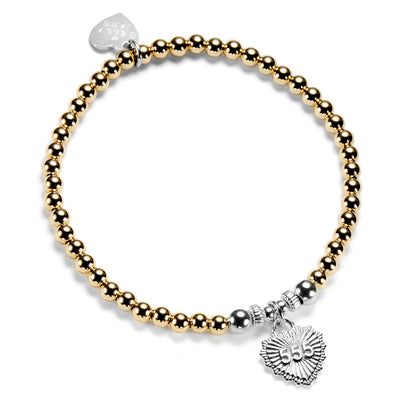 A close-up photo on a white background, of a gold-filled beaded bracelet with sterling silver focal beads and silver heart-shaped charm, featuring angel number 555 on the front of the charm.