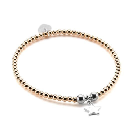 Bella Jane gold-filled beaded bracelet featuring a sterling silver small star charm, against a white background