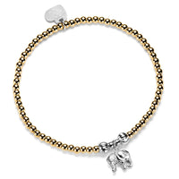 Gold-filled beaded bracelet with silver elephant charm on a white background