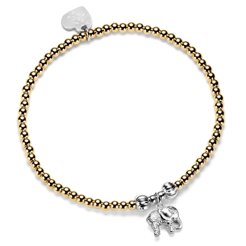 Gold-filled beaded bracelet with silver elephant charm on a white background
