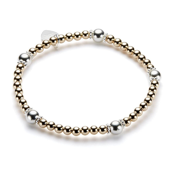 Bracelet with gold and silver beads on a white background