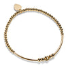 A gold-filled beaded stacking bracelet with focal noodle beads, on a white background.