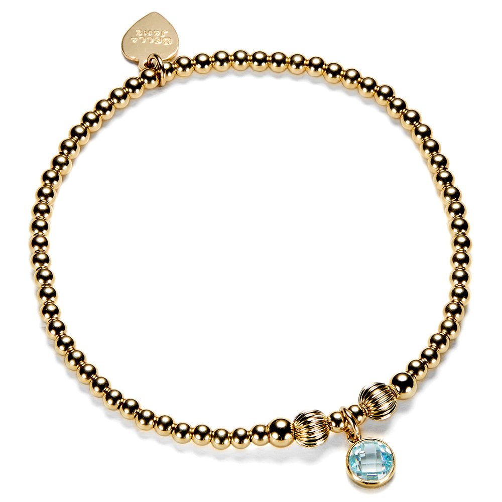Gold-filled beaded bracelet with an aqua coloured cubic zirconia charm, representing a March birthstone.