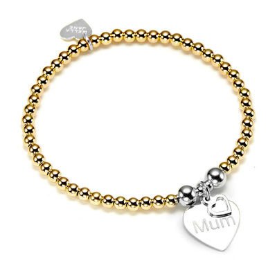 A gold beaded bracelet with a silver 'Mum' heart charm on a white background.