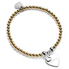 Gold beaded bracelet with silver heart-shaped charm featuring the word 'Nana' on a white background