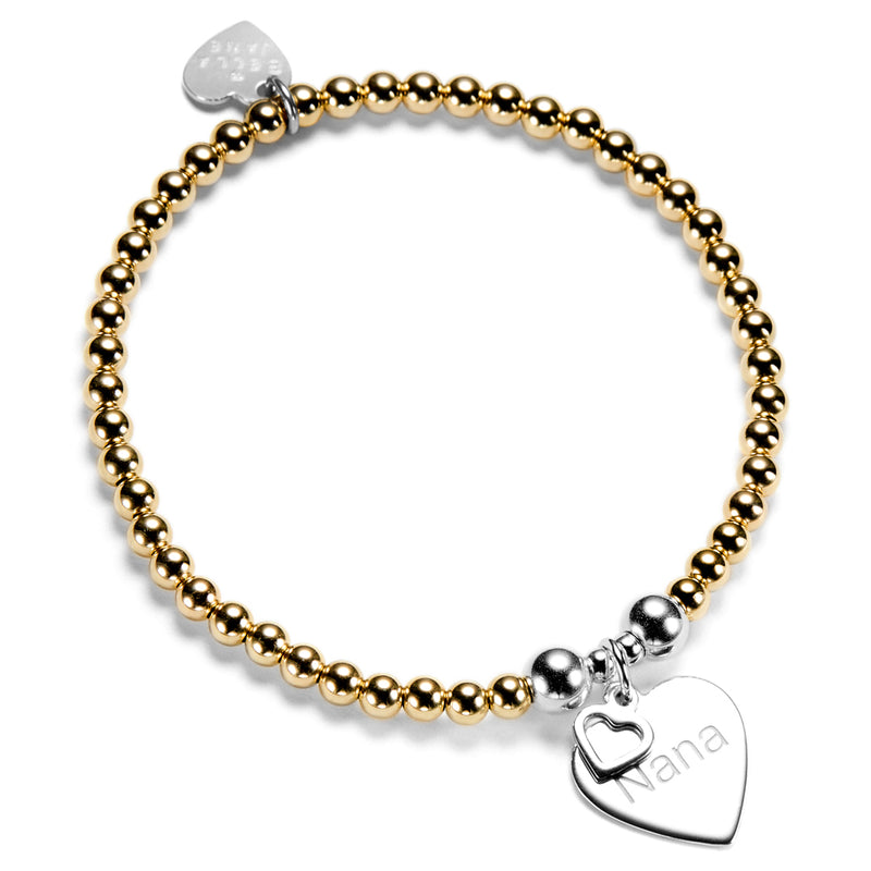 Gold beaded bracelet with silver heart-shaped charm featuring the word 'Nana' on a white background