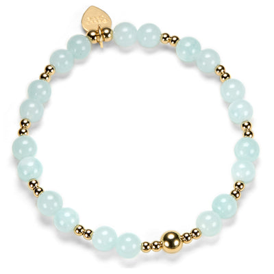 Bracelet with light blue beads and gold accents on a white background