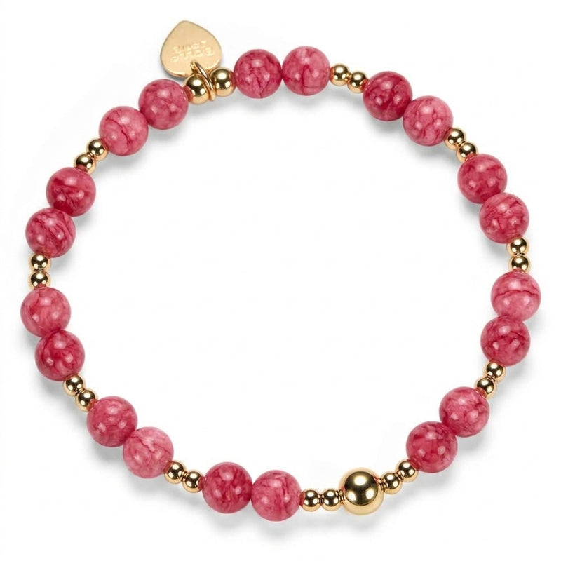 Raspberry coloured beaded bracelet featuring gold-filled beads, with a gold heart Bella Jane tag at the back, shown on a clean white background.