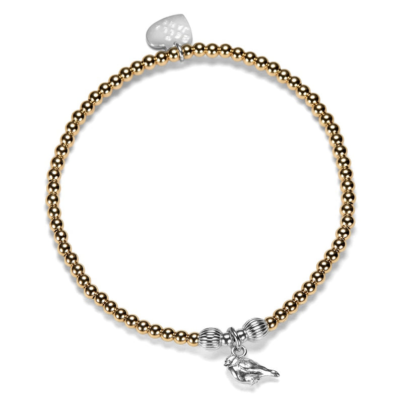 A gold-filled beaded stacking bracelet, featuring sterling silver focal beads and a sterling silver robin charm, shown on a plain white background.