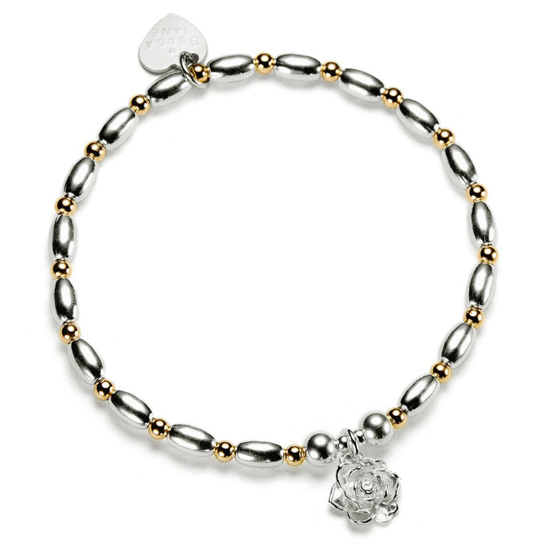 Silver and gold mixed metal beaded bracelet with a sterling silver flower charm, on a white background