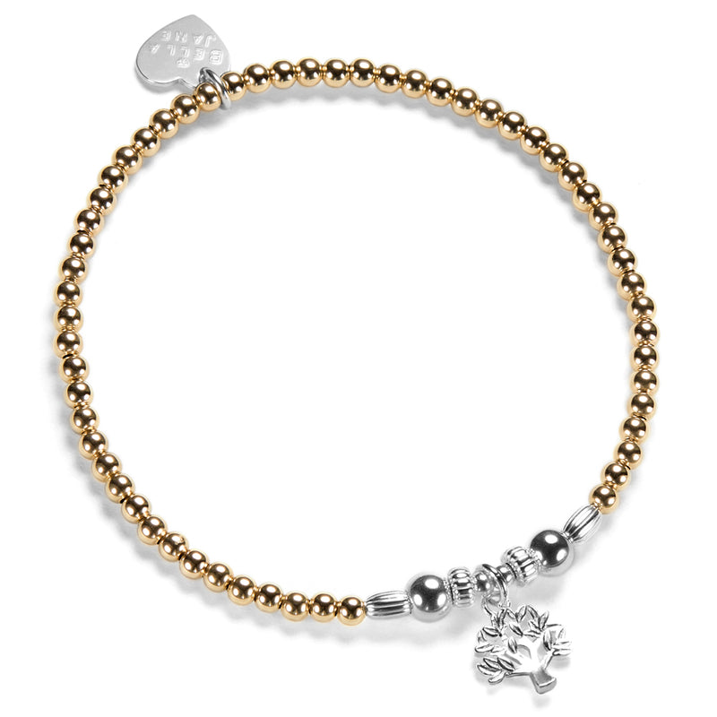 A gold and silver beaded bracelet with a silver tree of life charm and a heart-shaped tag engraved with Bella Jane at the back of the bracelet.