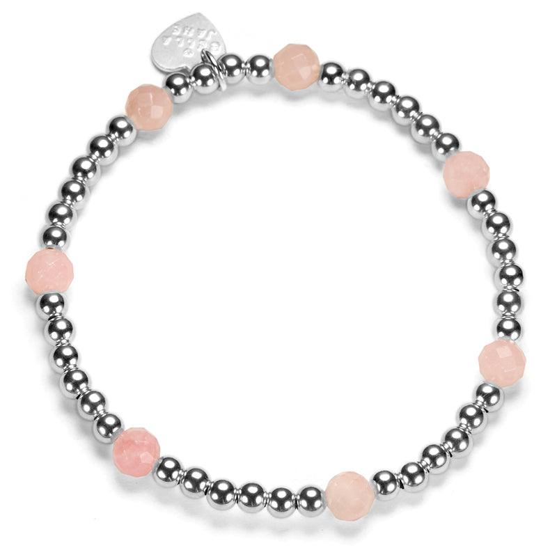 Beaded stacking bracelet with sterling silver and pink opal beads, with Bella Jane branded silver heart tag, on a white background.