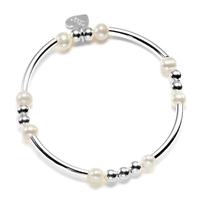 Sterling silver and freshwater pearl beaded bracelet with noodle shaped and round beads on a white background