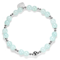 Bracelet with light blue beads and silver accents on a white background