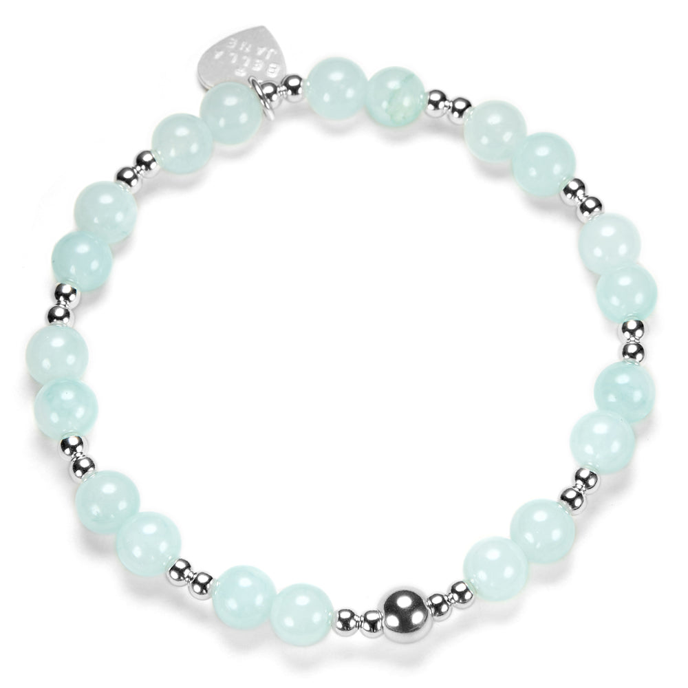 Bracelet with light blue beads and silver accents on a white background