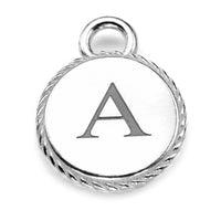Close up of the reverse side of the silver butterfly disc charm, featuring an engraved letter 'A', on a white background