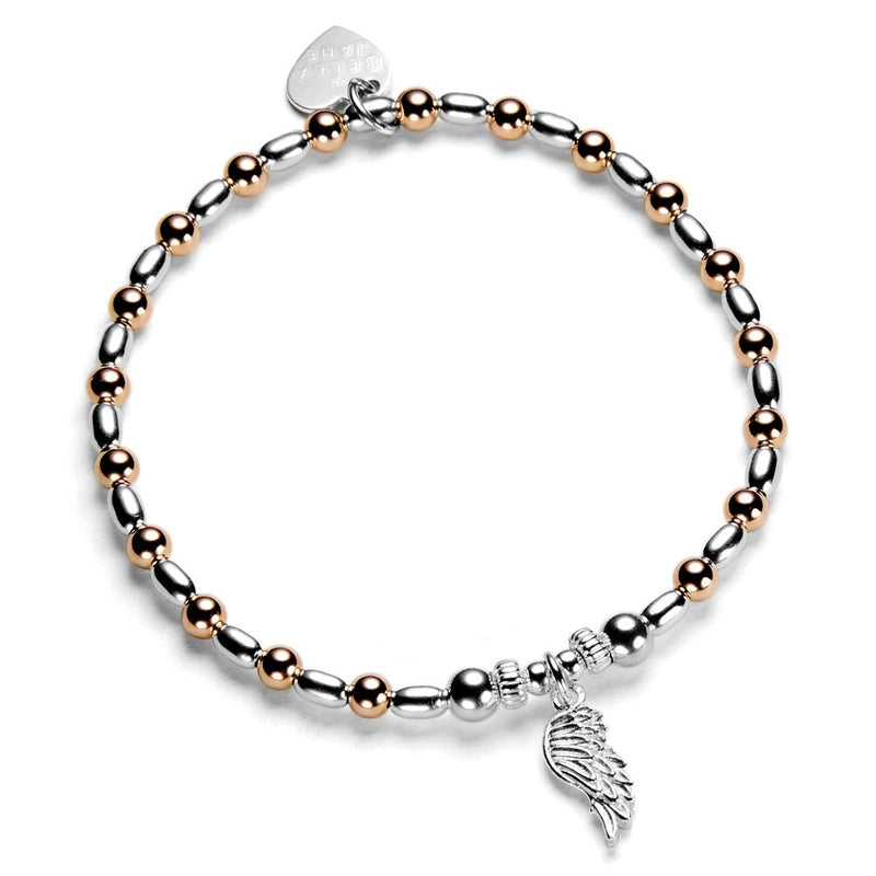 Bracelet with rose gold and silver beads and a single angel wing charm on a white background