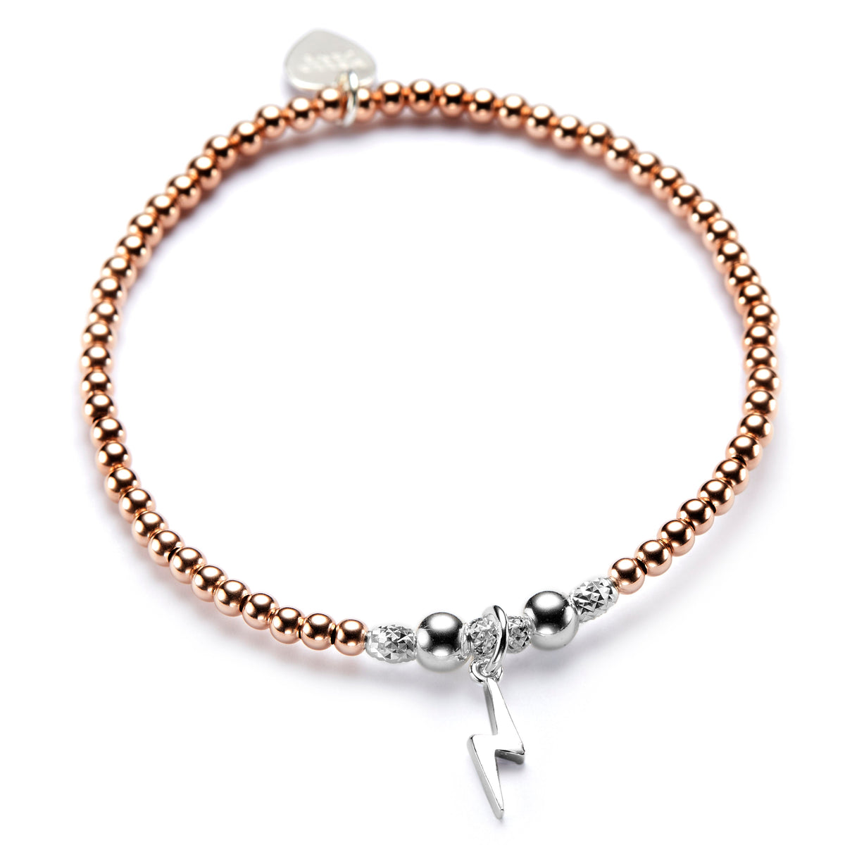 A rose gold stacking bracelet with a sterling silver lightning charm.