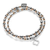 Silver and rose gold mixed-metal beaded bracelet duo featuring an open style, silver studded four leaf clover charm on a white background