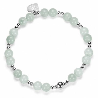 Bracelet with light green beads and silver accent beads on a white background