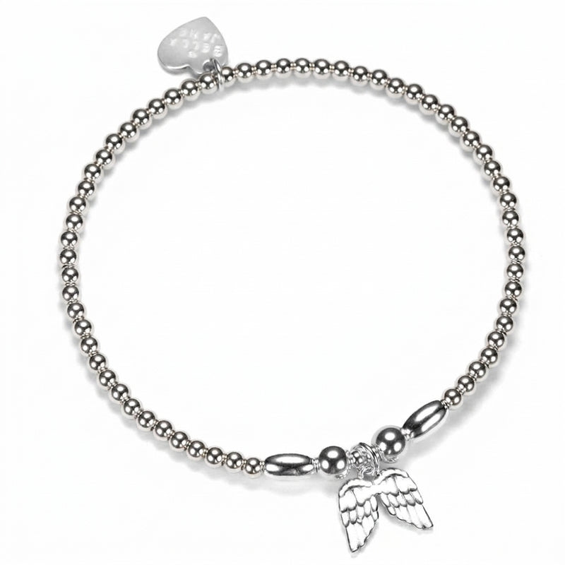 A sterling silver beaded stacking bracelet featuring a sterling silver angel wings charm, displayed on a white background.
