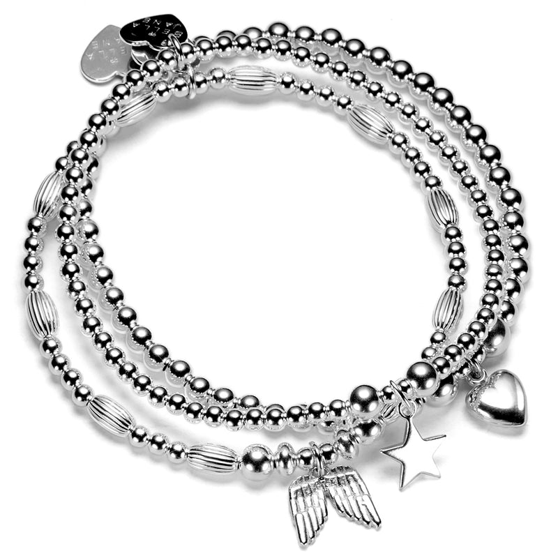 A set of three sterling silver bracelets stacked together, featuring heart, angel wings, and star charms.