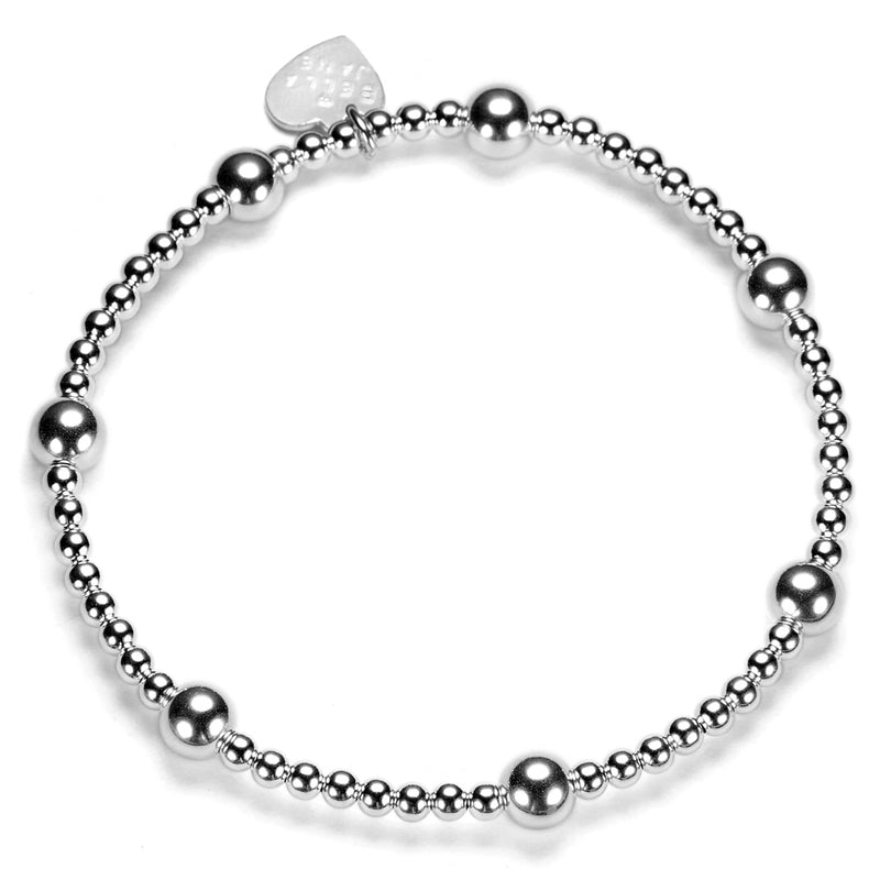 Silver beaded bracelet with a heart-shaped tag on a white background