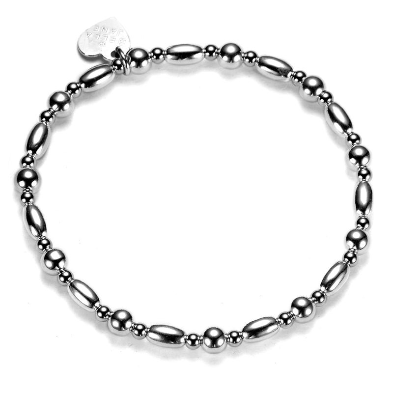 Sterling silver round and oval beaded stacking bracelet on a white background