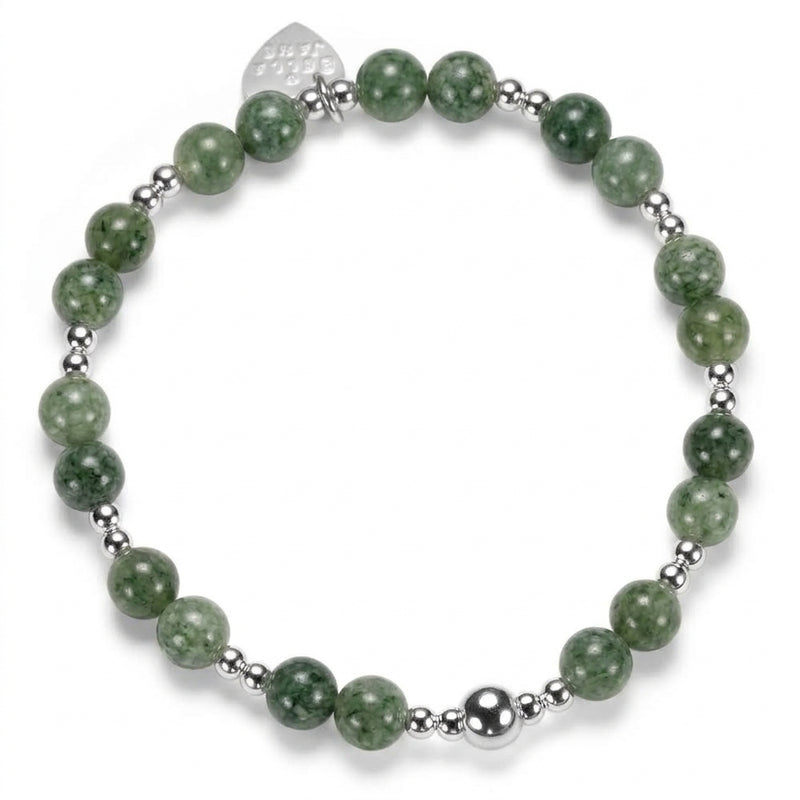 A beaded bracelet featuring round green stone beads and polished sterling silver beads, with a small silver heart tag engraved with Bella Jane, against a white background.