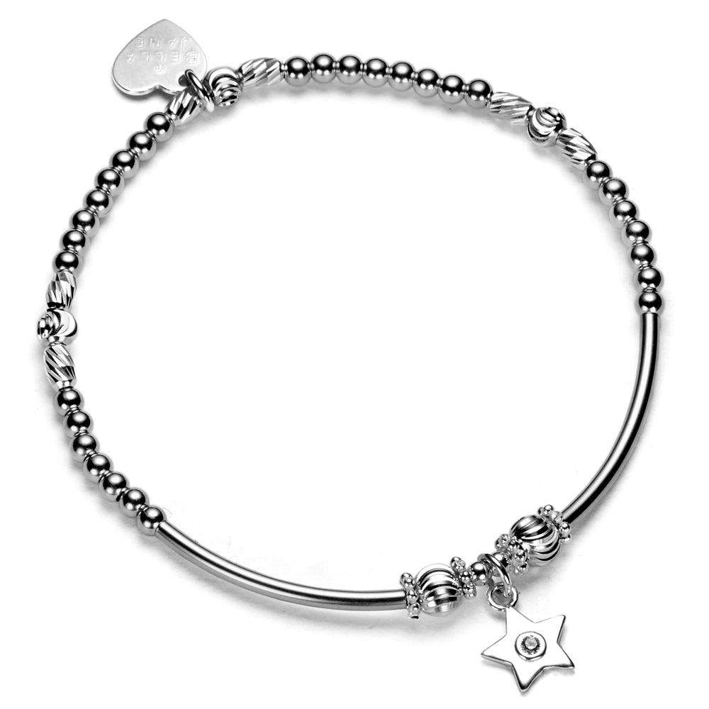 A sterling silver beaded bracelet, featuring, a star charm with tiny cubic zirconia stone in the centre and a heart tag, against a white background.