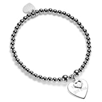 Silver beaded bracelet with a heart-shaped tag with the words 'you've got this' on a white background
