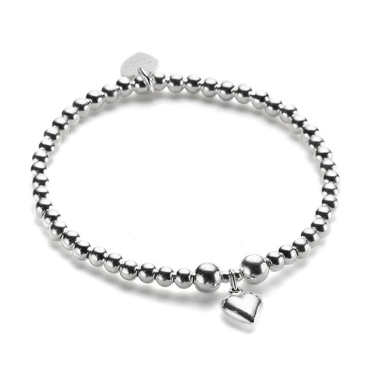 Sterling silver beaded bracelet with small heart charm