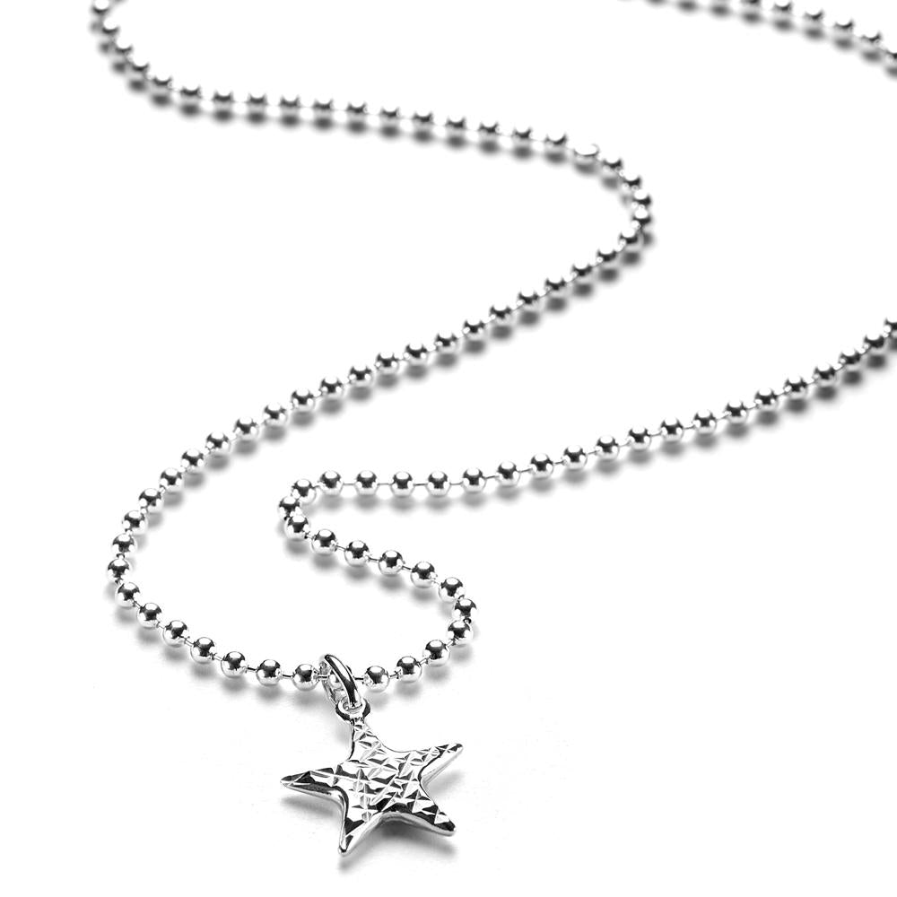 Sterling silver ball bead chain with a faceted cut star pendant, on a white background