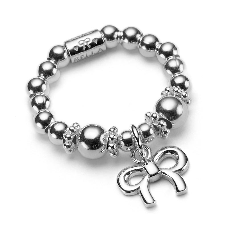 Silver beaded ring with small sterling silver bow charm, displayed against a white background