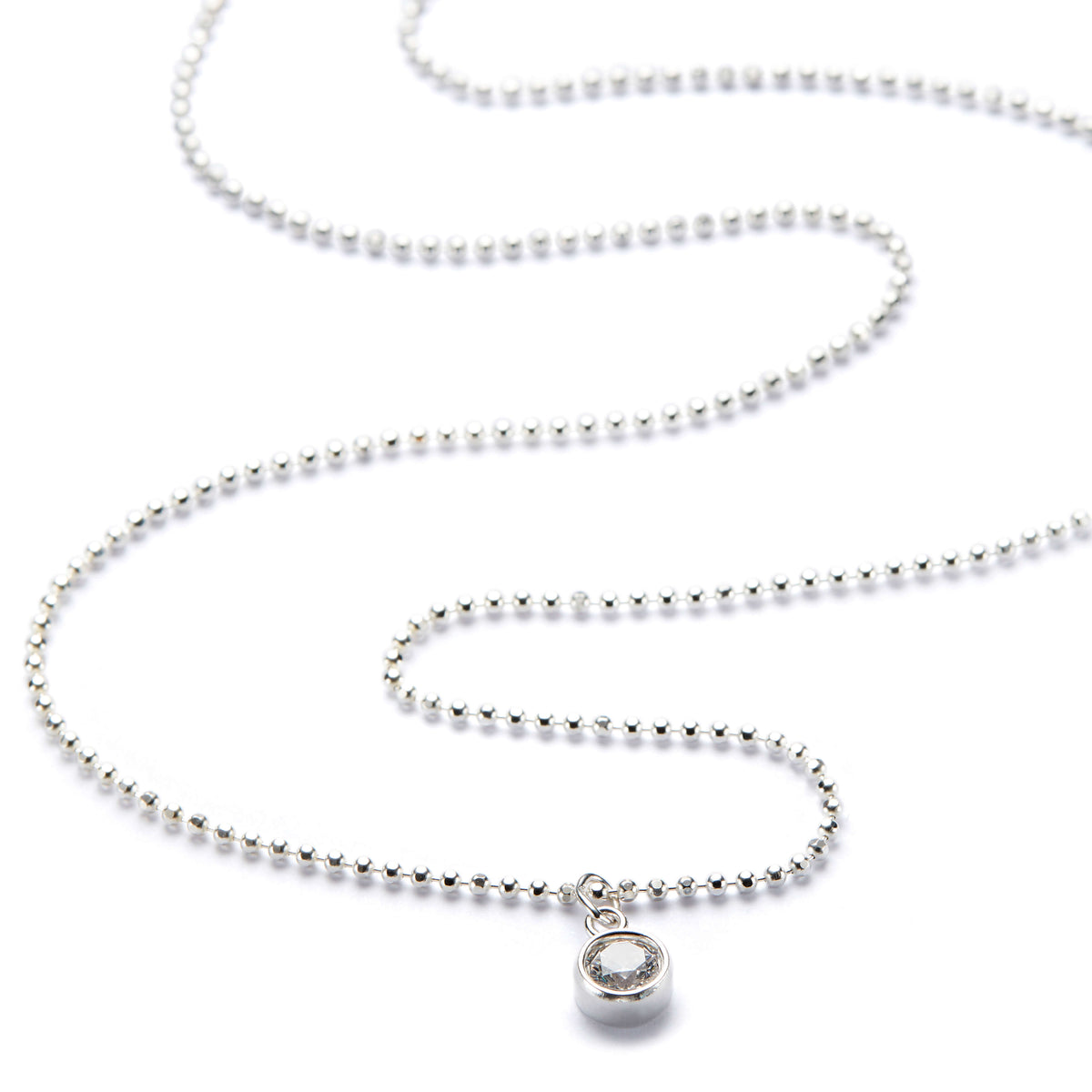 A sterling silver ball bead chain necklace with a cubic zirconia 'bling' charm.