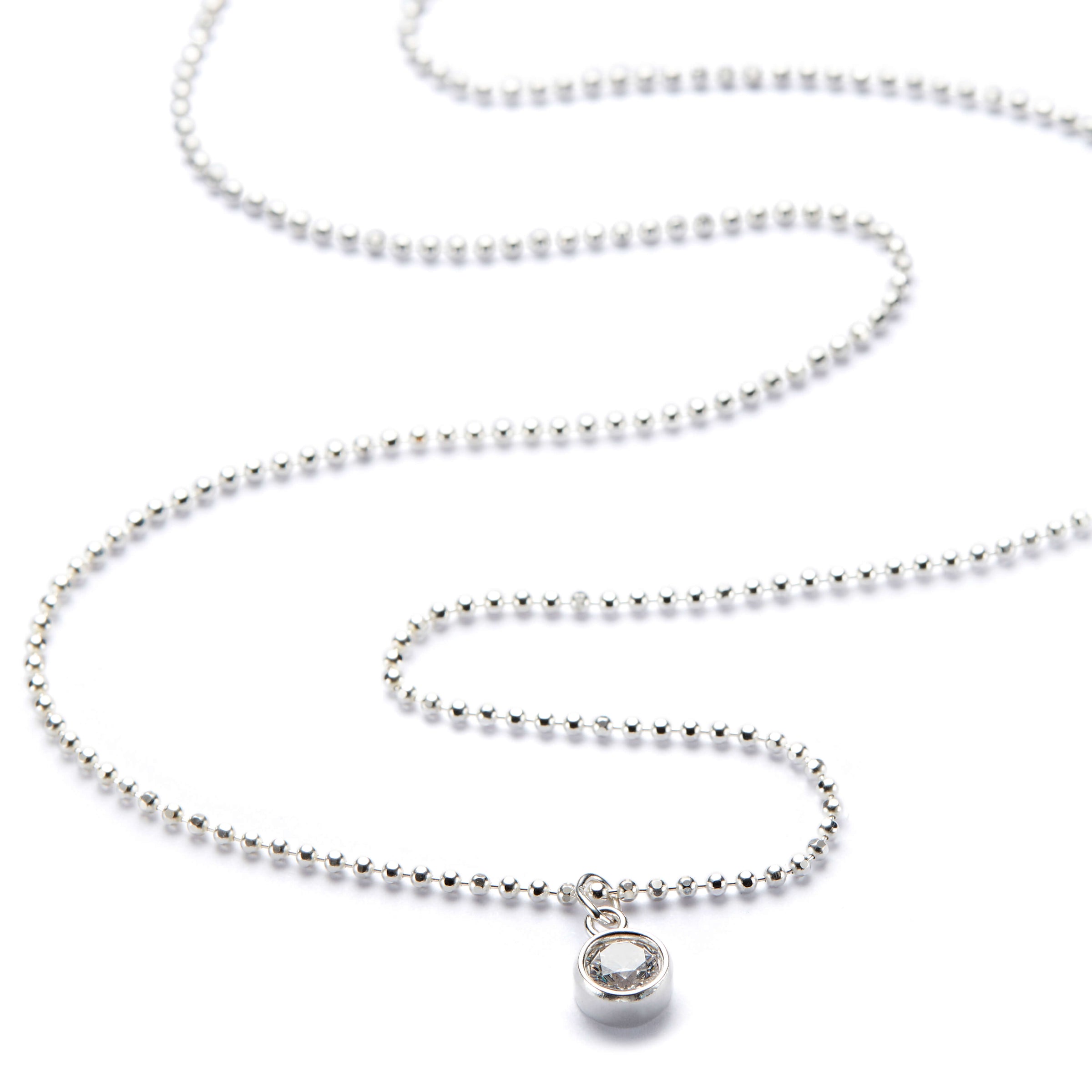 A sterling silver ball bead chain necklace with a cubic zirconia 'bling' charm.