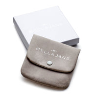 Grey jewellery pouch and box with 'Bella Jane' branding on a white background