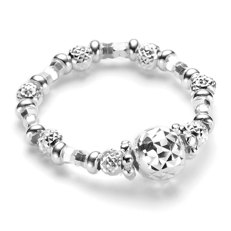 A sterling silver ring with beaded detailing and a diamond cut central bead