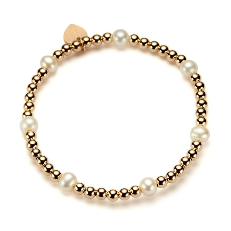 Bracelet with gold beads and freshwater pearls on a white background