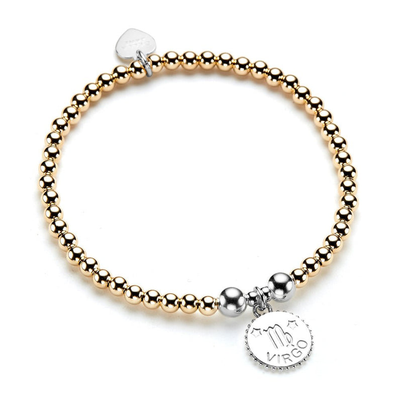 Bracelet with gold and silver beads and a sterling silver Virgo zodiac charm on a white background