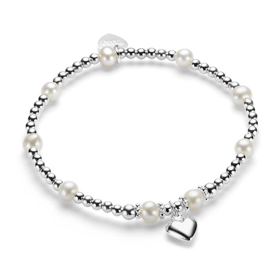 A sterling silver bracelet with freshwater pearls and a silver heart charm, displayed against a white background.