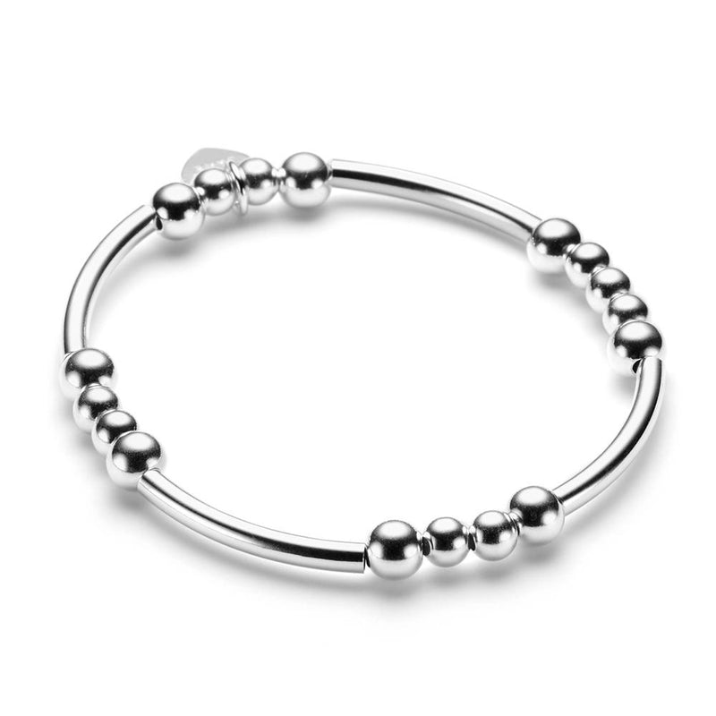 Sterling silver beaded bracelet with noodle shaped and round beads on a white background