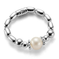 Sterling silver beaded stacking ring featuring a focal freshwater pearl at the front and a branded Bella Jane bead at the back.