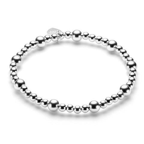 A sterling silver beaded bracelet with a mix of 4mm and 6mm round beads and a signature sterling silver Bella Jane branded heart tag.