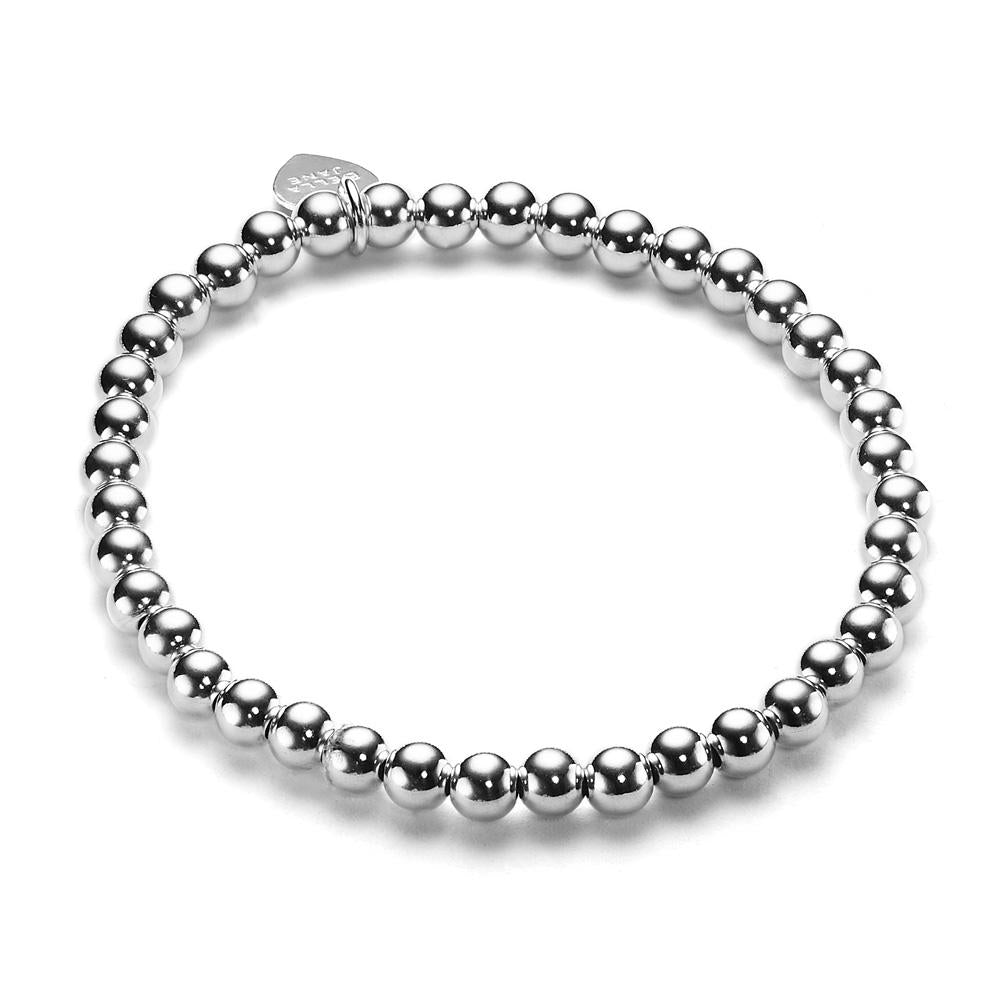 A sterling silver beaded bracelet with 5mm round beads and the Bella Jane sterling silver heart tag, displayed on a white background.